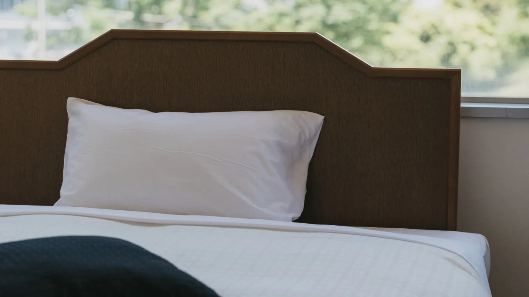 Image of the hotel room bed